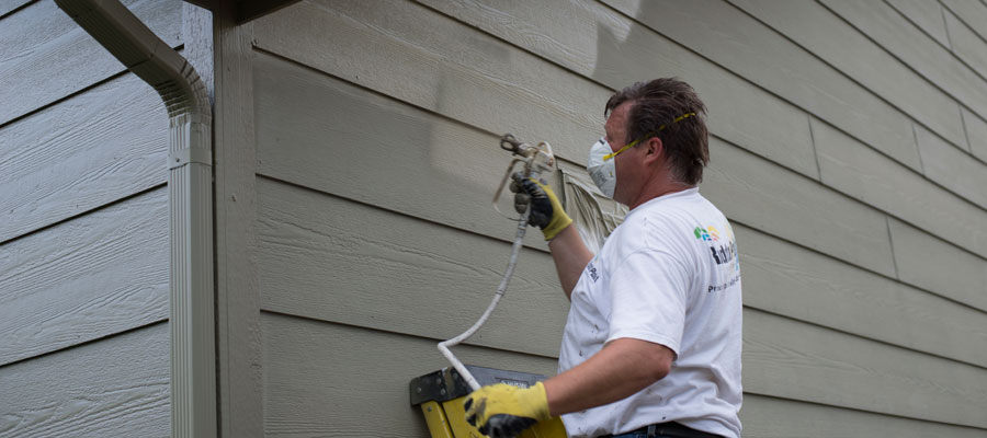 The advantages of spraying vs rolling exterior paint