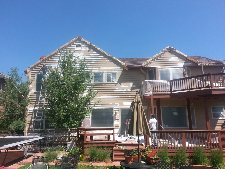 Prepping the exterior of a Denver area home for fresh paint.