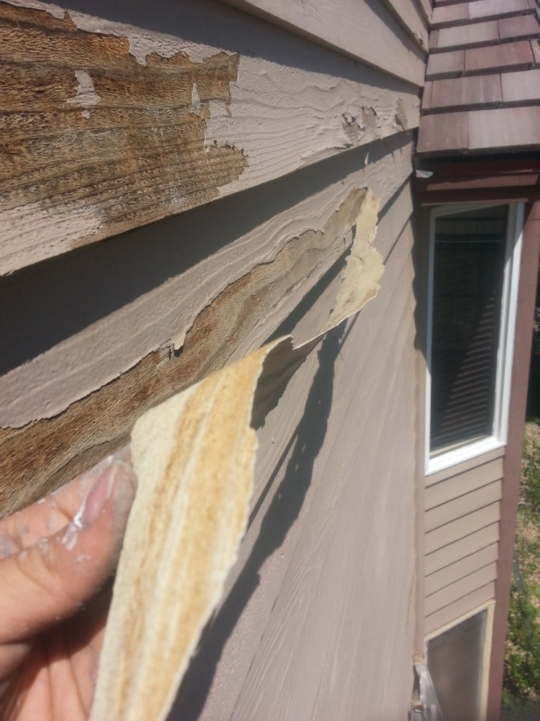 Peak Pro Painting prepping the exterior of a Denver area home for fresh paint.